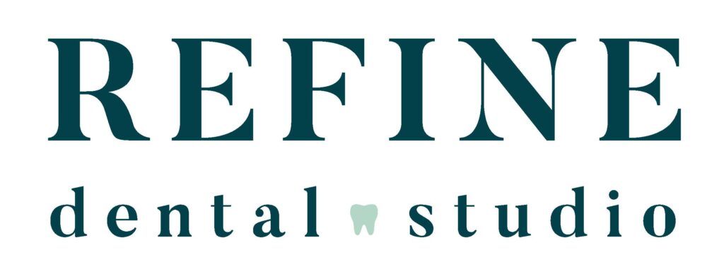 The image shows the logo of "REFINE dental studio." The word "REFINE" is written in large, bold, uppercase letters, and the words "dental studio" are written in smaller, lowercase letters below it. The letter "a" in "dental" is replaced with a tooth icon.